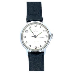 Montre vintage Timex à remontage manuel en acier inoxydable