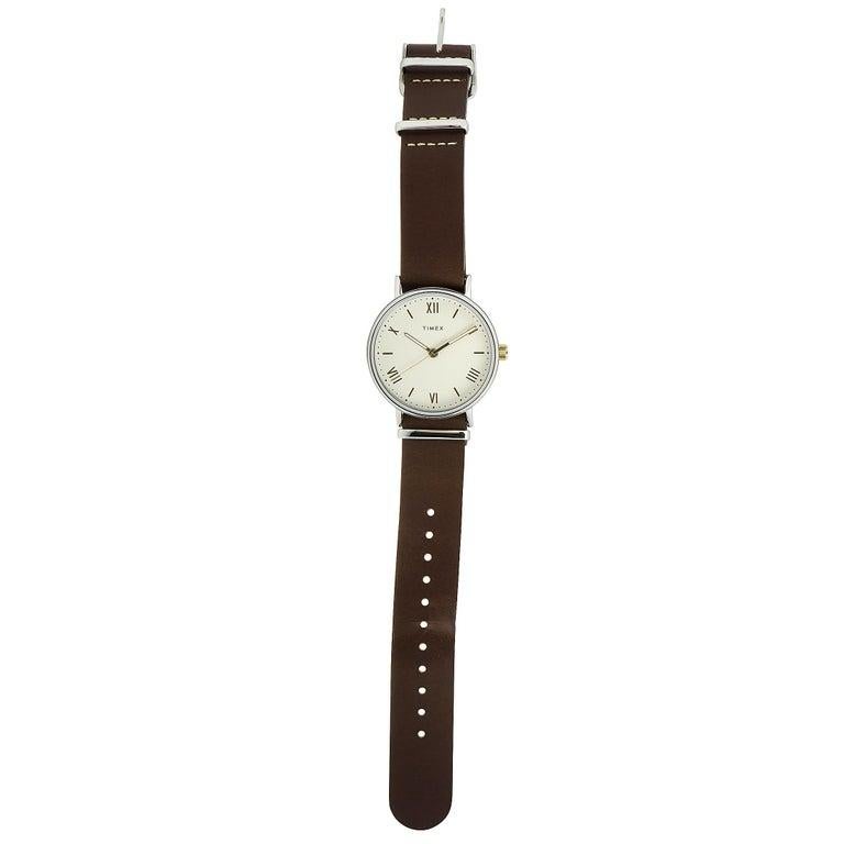 This is the Timex Southview 41 mm, reference number TW2R80400. The watch boasts a silver-tone brass case that is fitted with a stainless steel back and measures 41 mm in diameter. This timepiece is powered by a quartz movement and indicates hours,