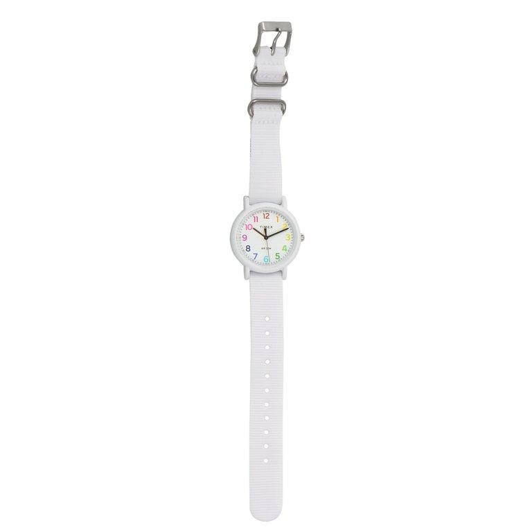 This is the Timex Weekender Color Rush, reference number TWG018200. The watch is presented with a 34 mm white resin case that boasts stainless steel back. The case offers water resistance of 30 meters and is mounted onto a white fabric slip-through