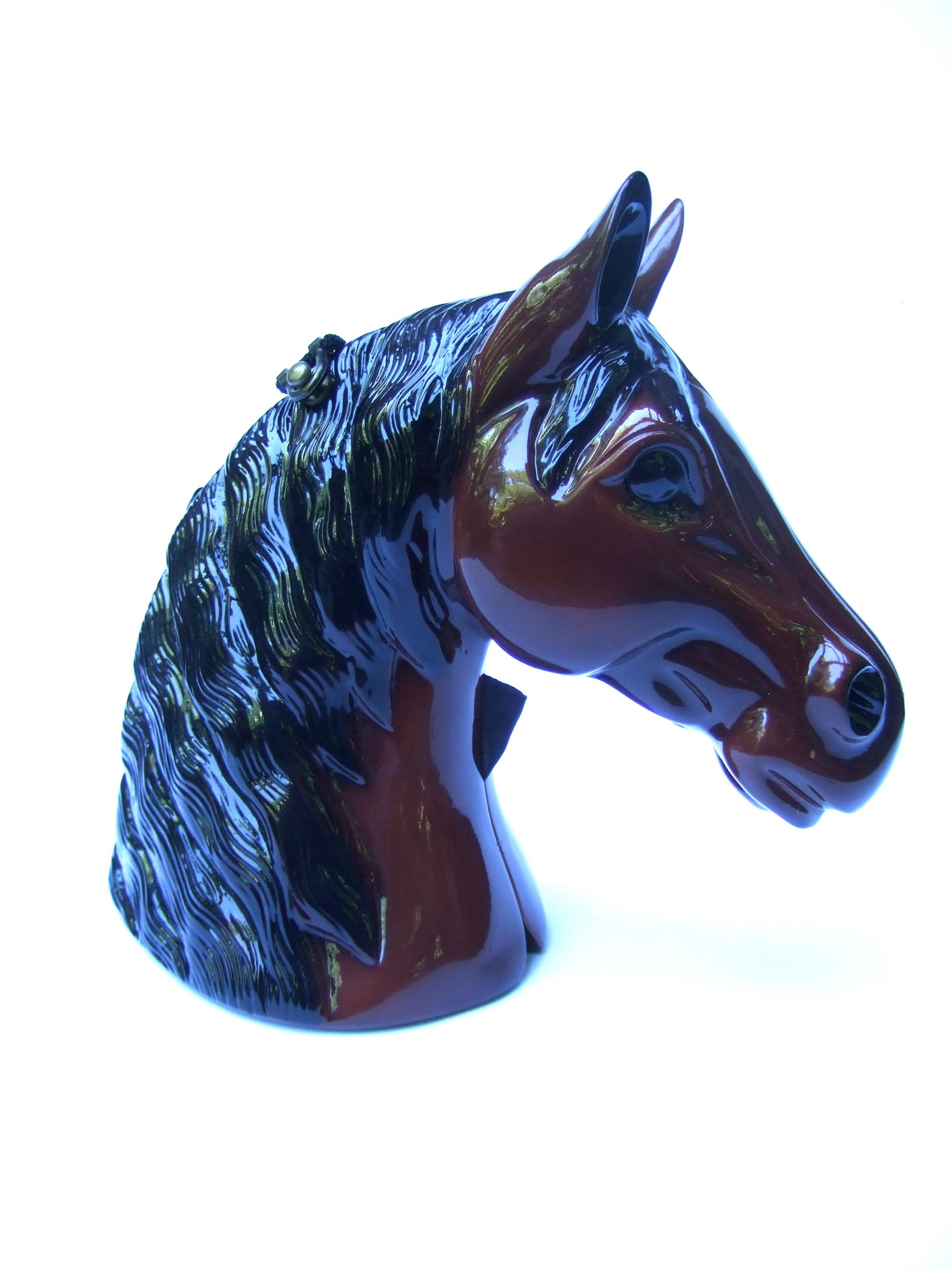 Timmy Woods Beverly Hills wood enamel handmade equine shoulder bag c 2000
The majestic horse head is sheathed in glossy brown & black enamel lacquer 
The sinuous mane is distinguished with shiny black enamel. The darker shades 
of brown enamel best