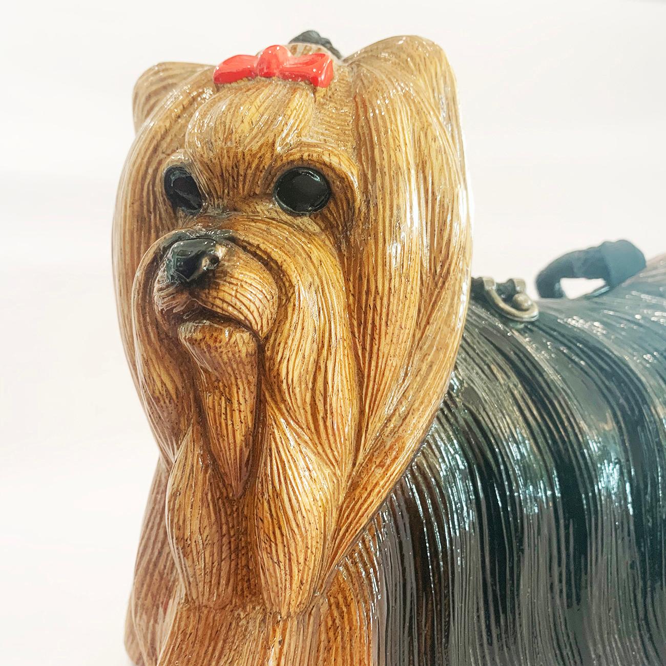 A Yorkshire Terrier (Yorkie) Handbag, by Timmy Woods, Registered Design, of Beverly Hills. A specialist in Designer Handbags. Hand carved, solid wood body with hand made wooden slotted hinge, black Satin interior, with elastic hinged closure with