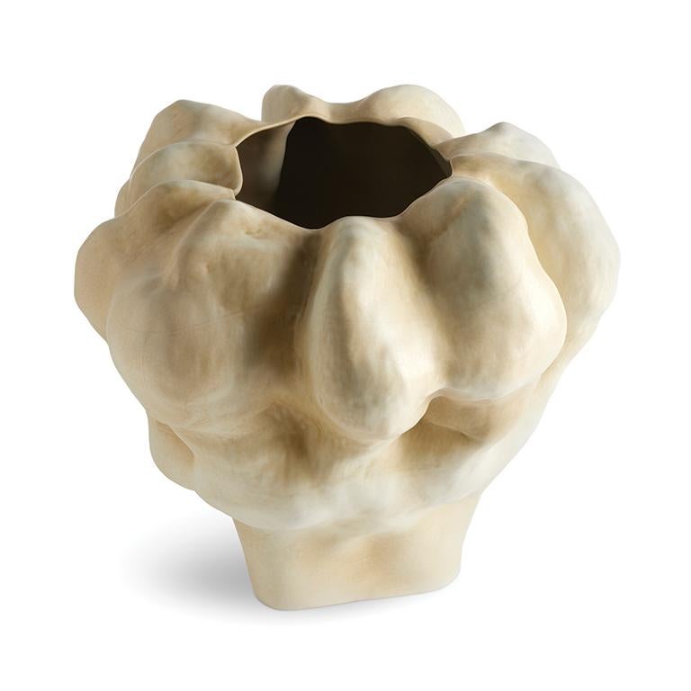 Porcelain vessels with an ancient feel, inspired by the mineral tones of the earth around the biblical copper mines in the Arava desert of Israel, known as King Solomon's Mines. Sculpted and glazed by hand, each piece has intriguing character.

Fine