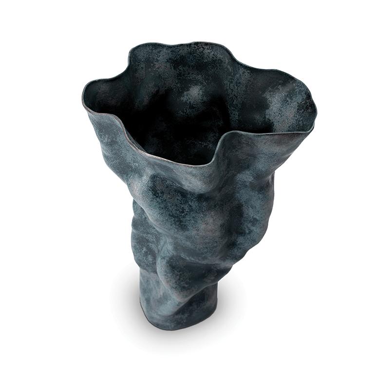 Porcelain vessels with an ancient feel, inspired by the mineral tones of the earth around the biblical copper mines in the Arava desert of Israel, known as King Solomon's Mines. This commanding 22