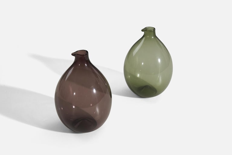 A green and brown hand blown glass pair of vases, designed by Timo Sarpaneva for Ittala.
 