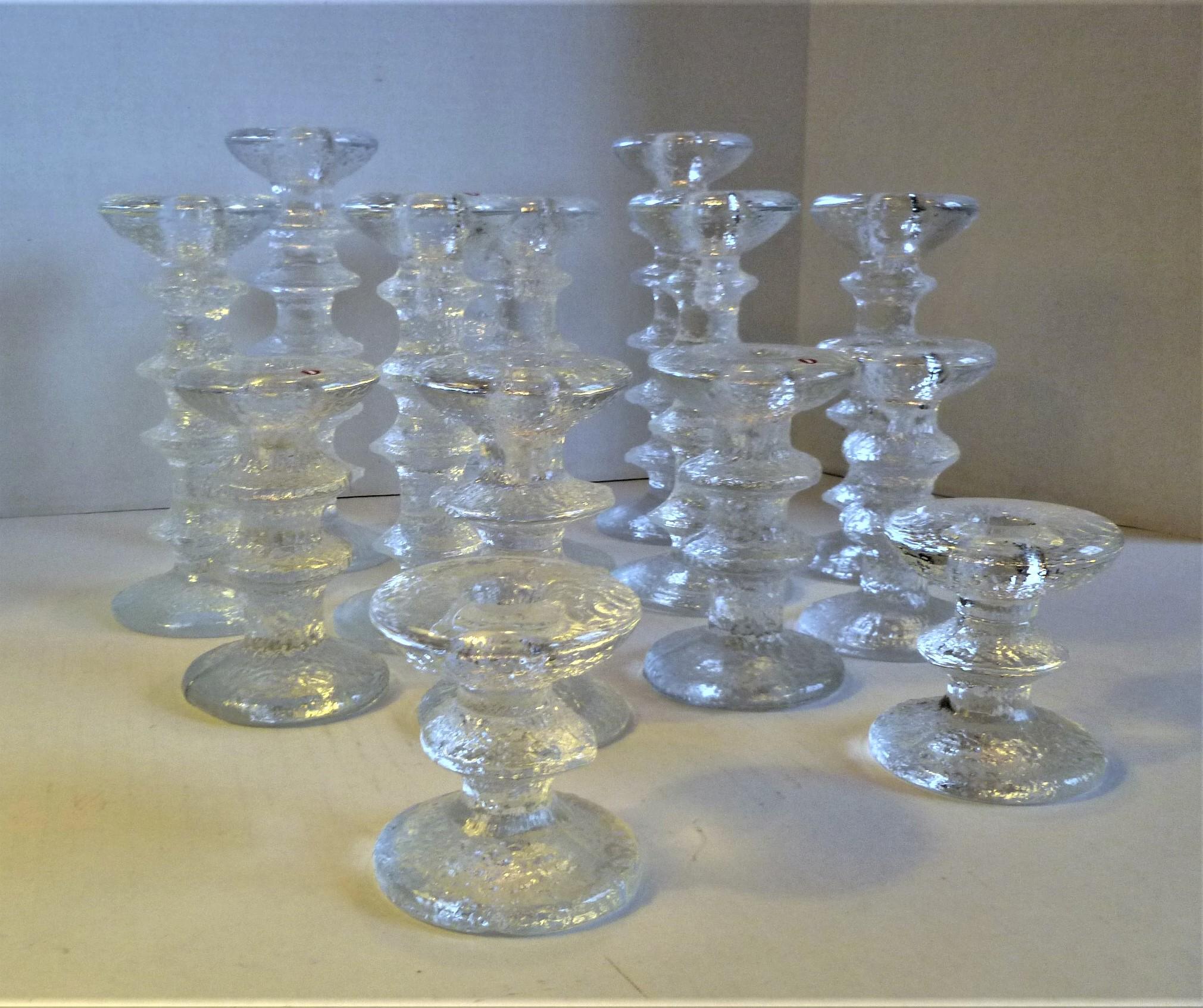 REDUCED FROM $1,250....Group of 14 Festivo textured glass candleholders by Timo Sarpaneva for Iittala Finland. According to Iittala's website, Sarpaneva original design was a wine glass that would accommodate a full bottle of wine, great!! The