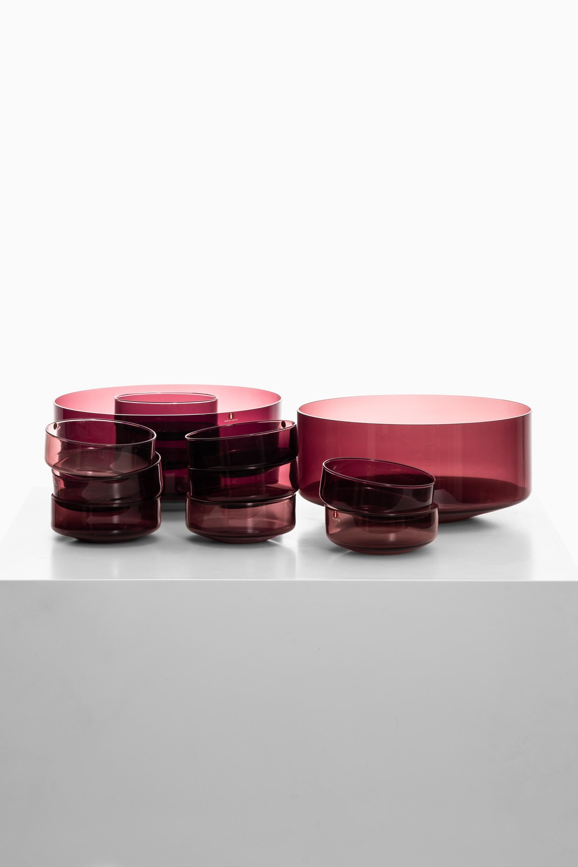 A set of 11 small and 2 big glass bowls designed by Timo Sarpaneva. Produced by Iittala in Finland.