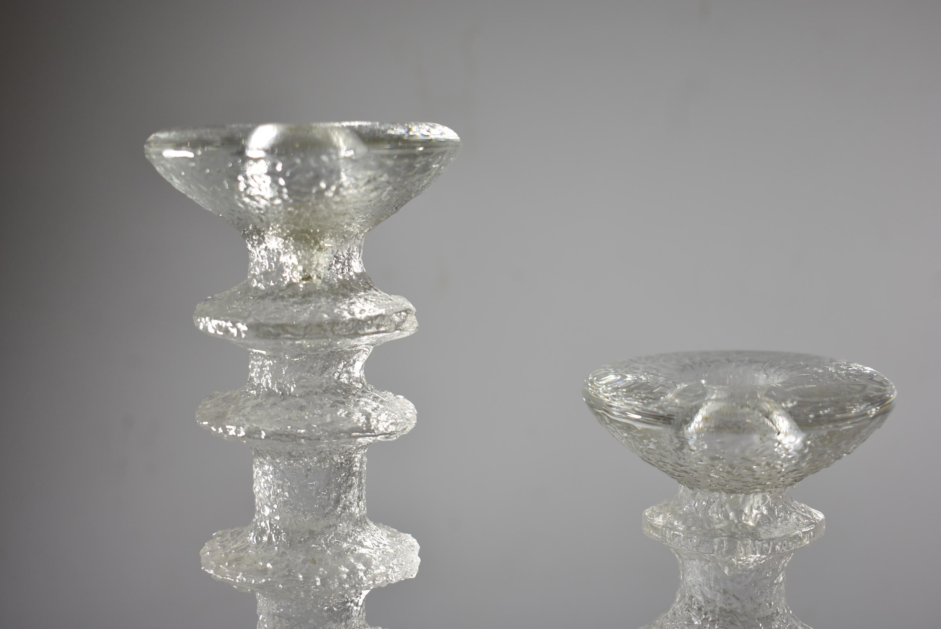 Six varied height Mid-Century Modern candle holders by Finish designer Timo Sarpaneva.