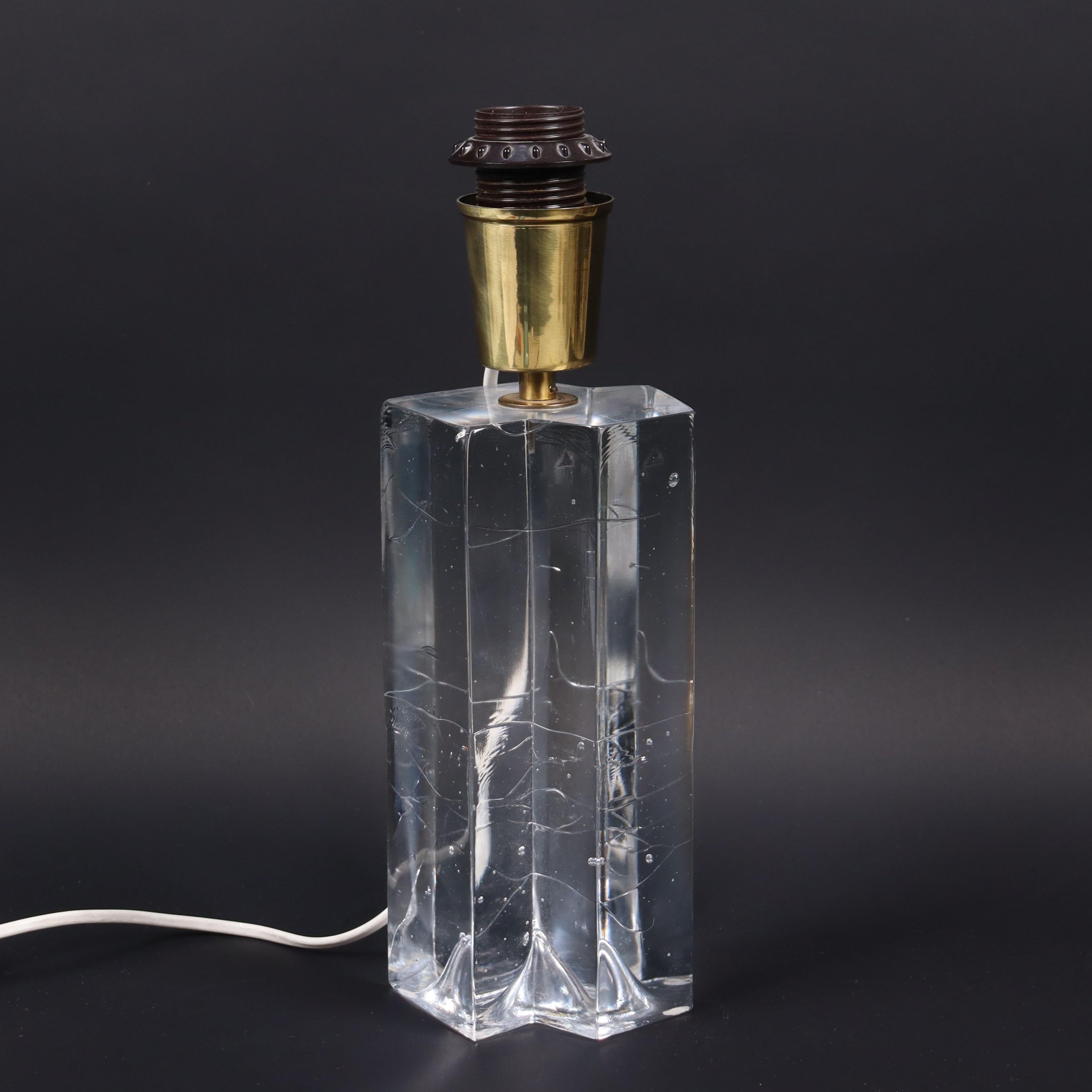 Timo Sarpaneva cast glass table lamp Model Arkipelago for Ittala 1960s.
An impressive table lamp in solid cast glass model 