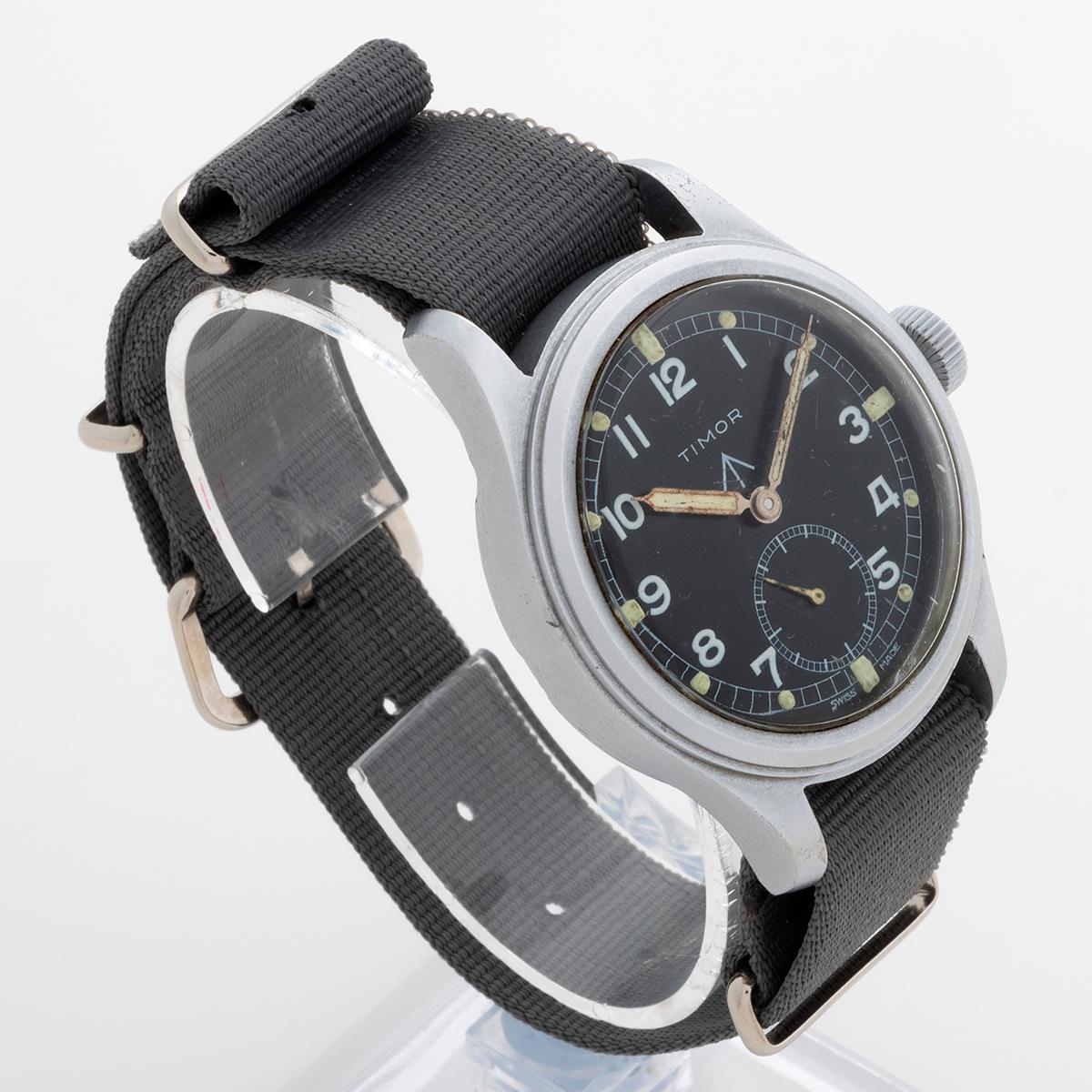 Our vintage and rare Timor is an issued military watch, dating from 1945. The Dirty Dozen is a later nickname, relating to the twelve companies who tendered and supplied the British armed forces with wristwatches to MOD specification, from the