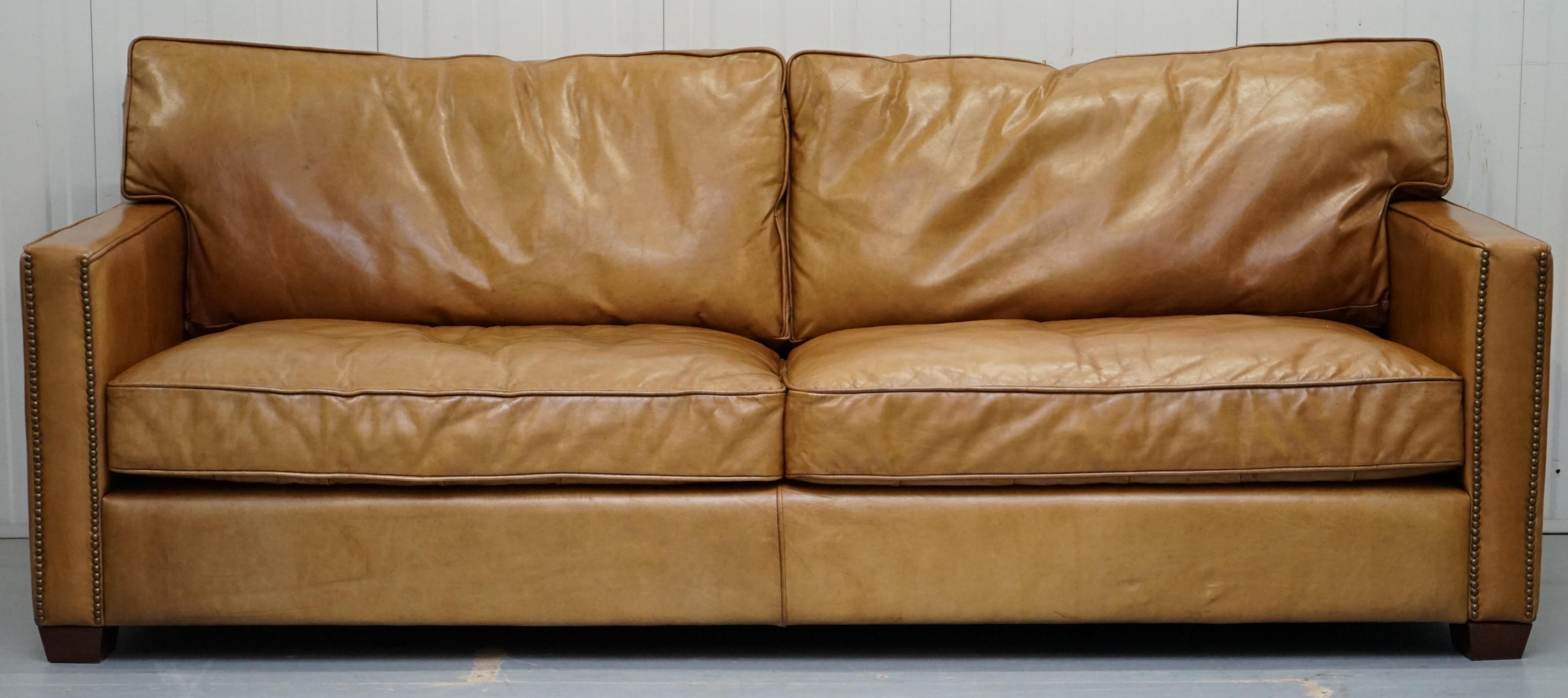 We are delighted to offer for sale this lovely and very comfortable Timothy Oulton Viscount William large three seat brown leather sofa RRP £2175.

We have deep cleaned hand condition waxed and hand polished it from top to bottom, there will be