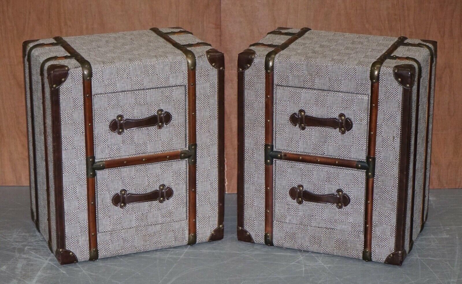 We are delighted to offer for sale these absolutely stunning Timothy Oulton style bedside tables in grey fabric, the handles are made of leather and there are beautiful wood details around, giving your bedroom a lovely style.

We have cleaned