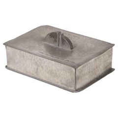 Tin box by designer René Delavan