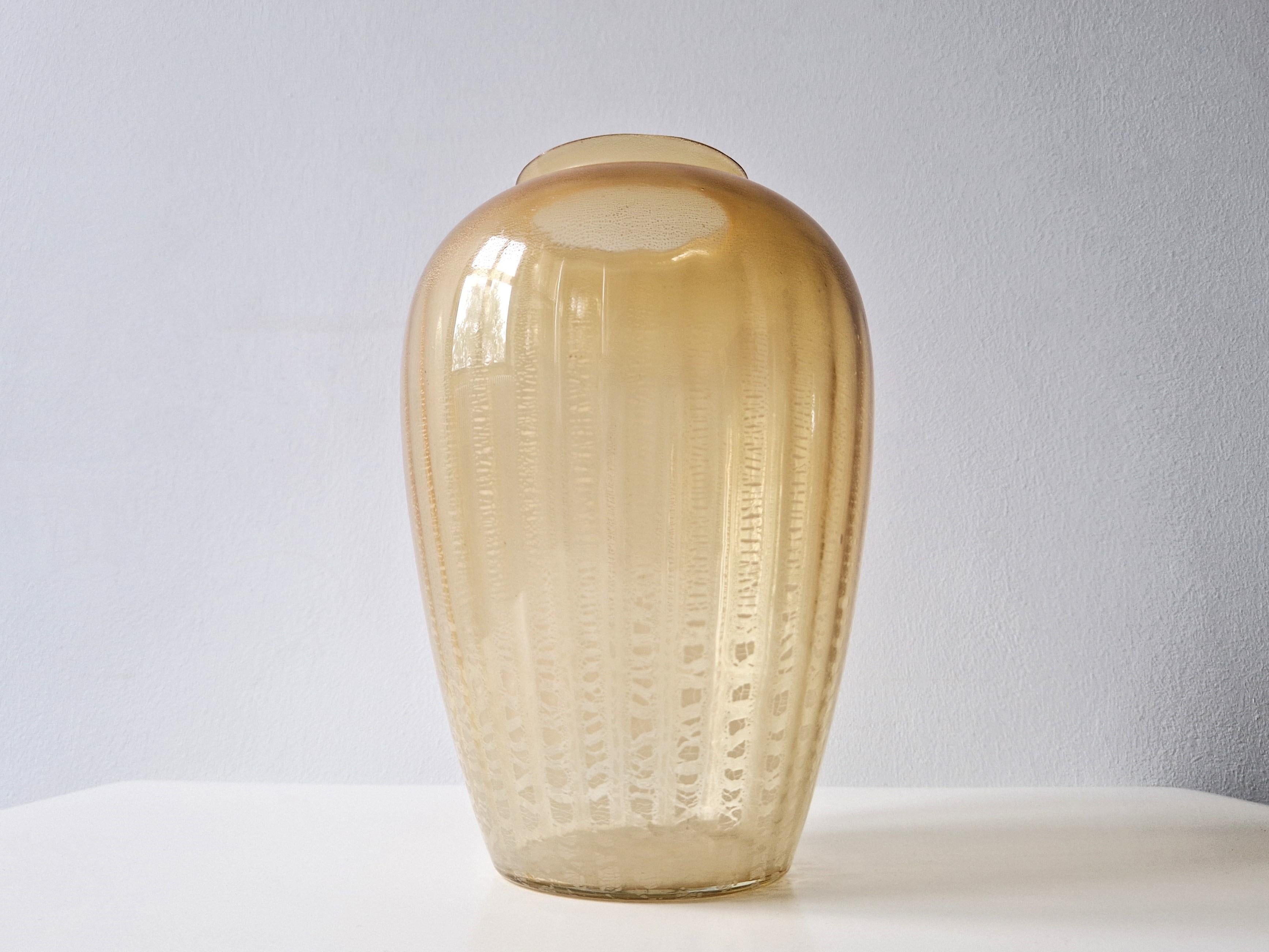 The 'Sonoor' vase, model VS0154, was designed by Andries Dirk Copier for the Leerdam glass factory in The Netherlands in 1938. The Sonoor series, with crackled glass, were the first developed vases by Copier. He was inspired to make these vases