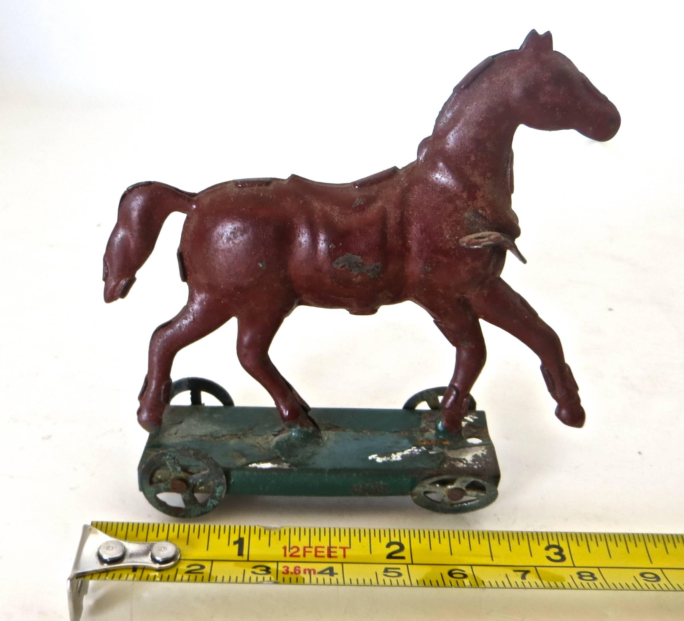 Folk Art Tin Horse on Platform Penny Toy 'Diminutive', circa 1890, German