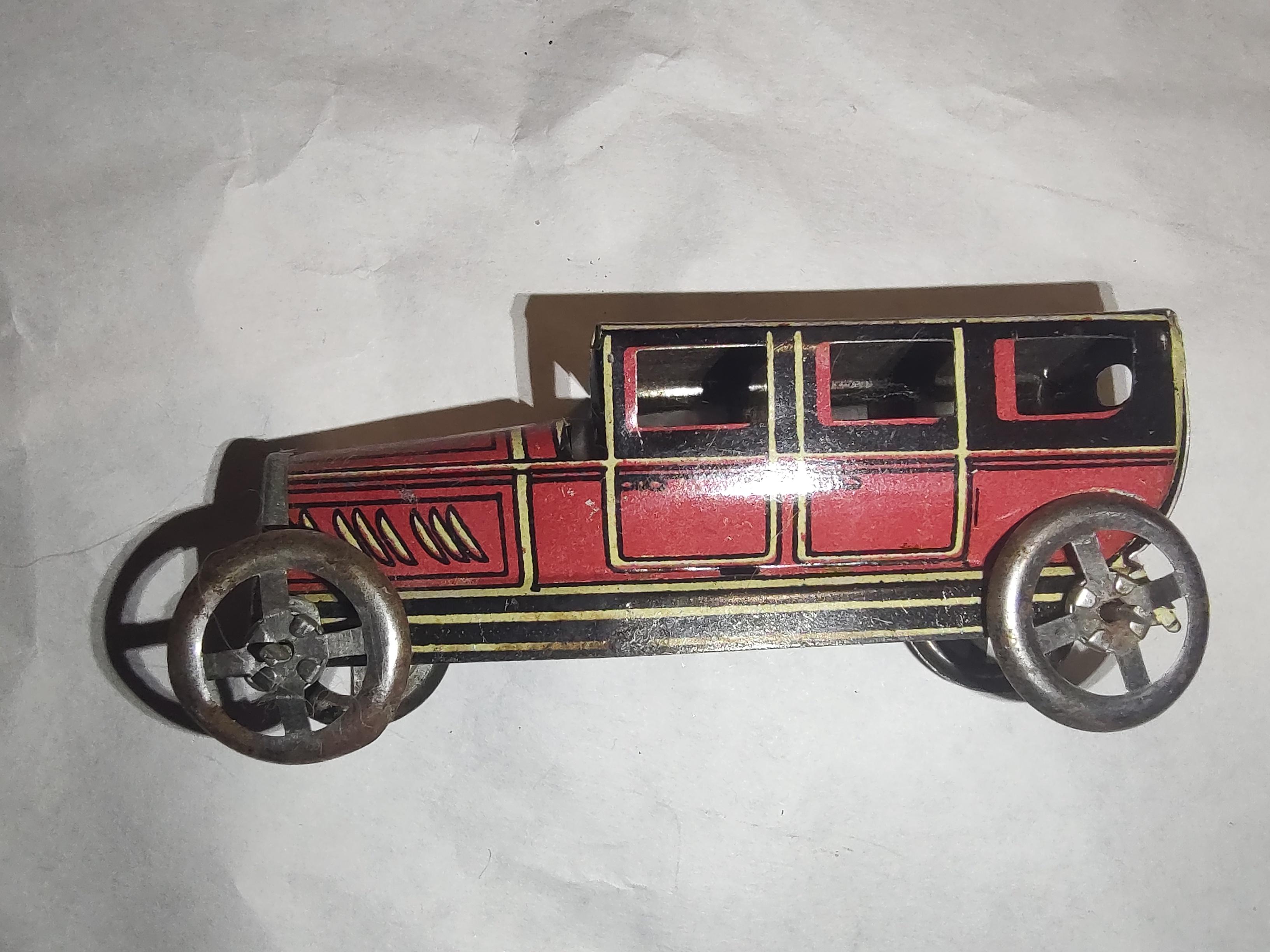 Hand-Crafted Tin Litho Penny Toys Stake & Tanker Truck and a Sedan by Meier For Sale