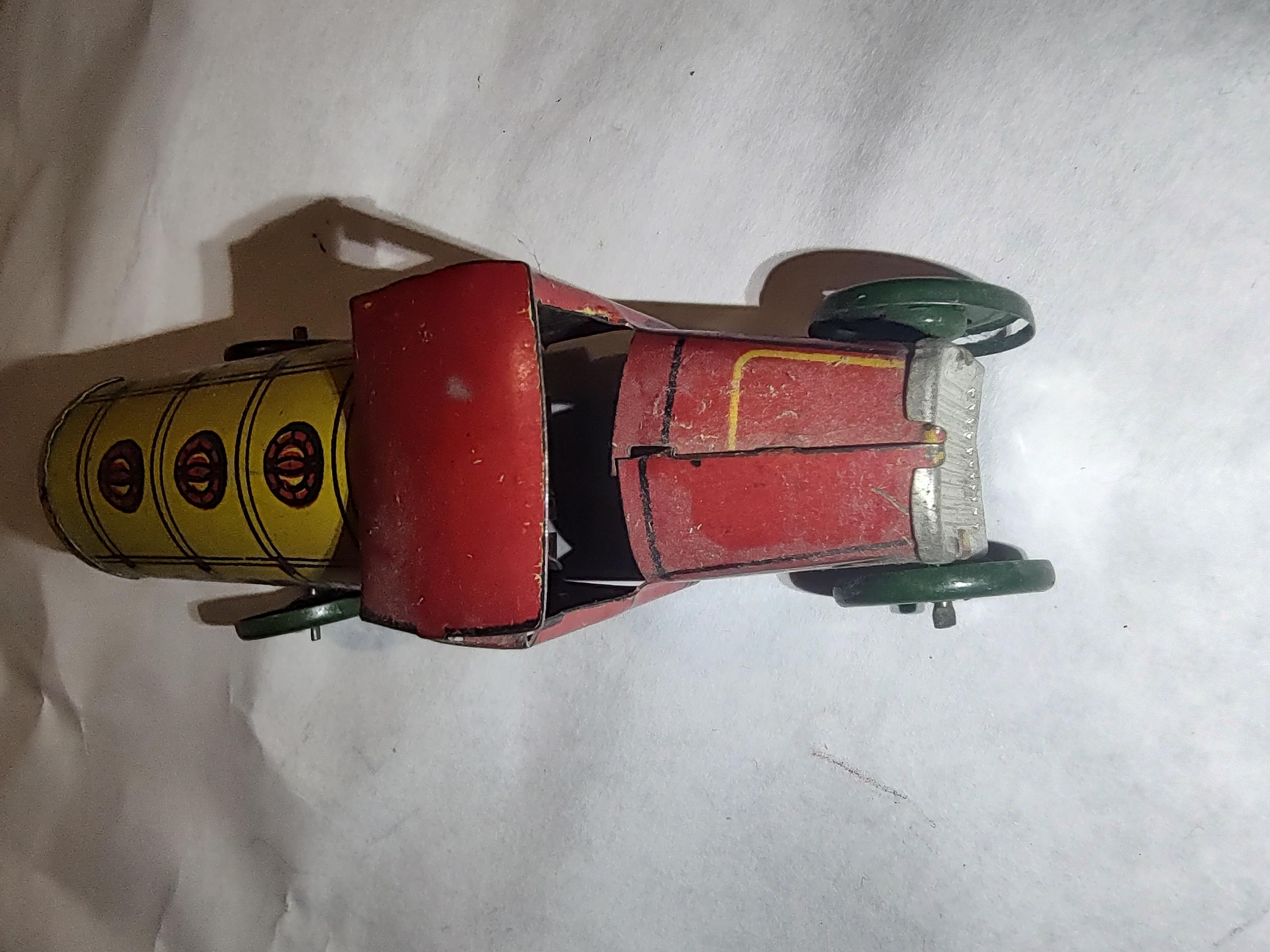 Mid-20th Century Tin Litho Penny Toys Stake & Tanker Truck and a Sedan by Meier For Sale