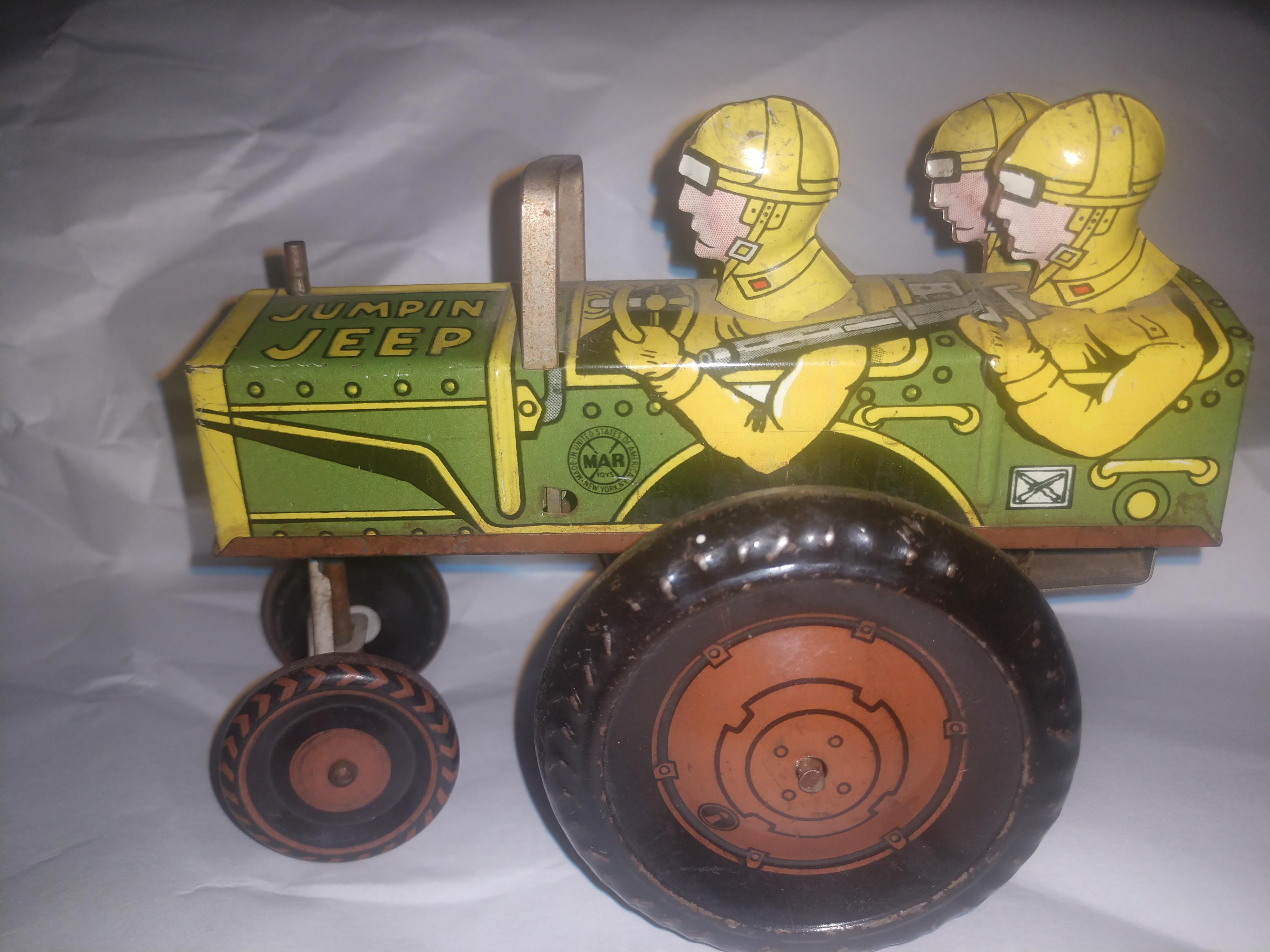 Mud Century Tin Litho Windup Toy by Louis Marx "Jumpin Jeep" C 1950 For Sale at 1stDibs