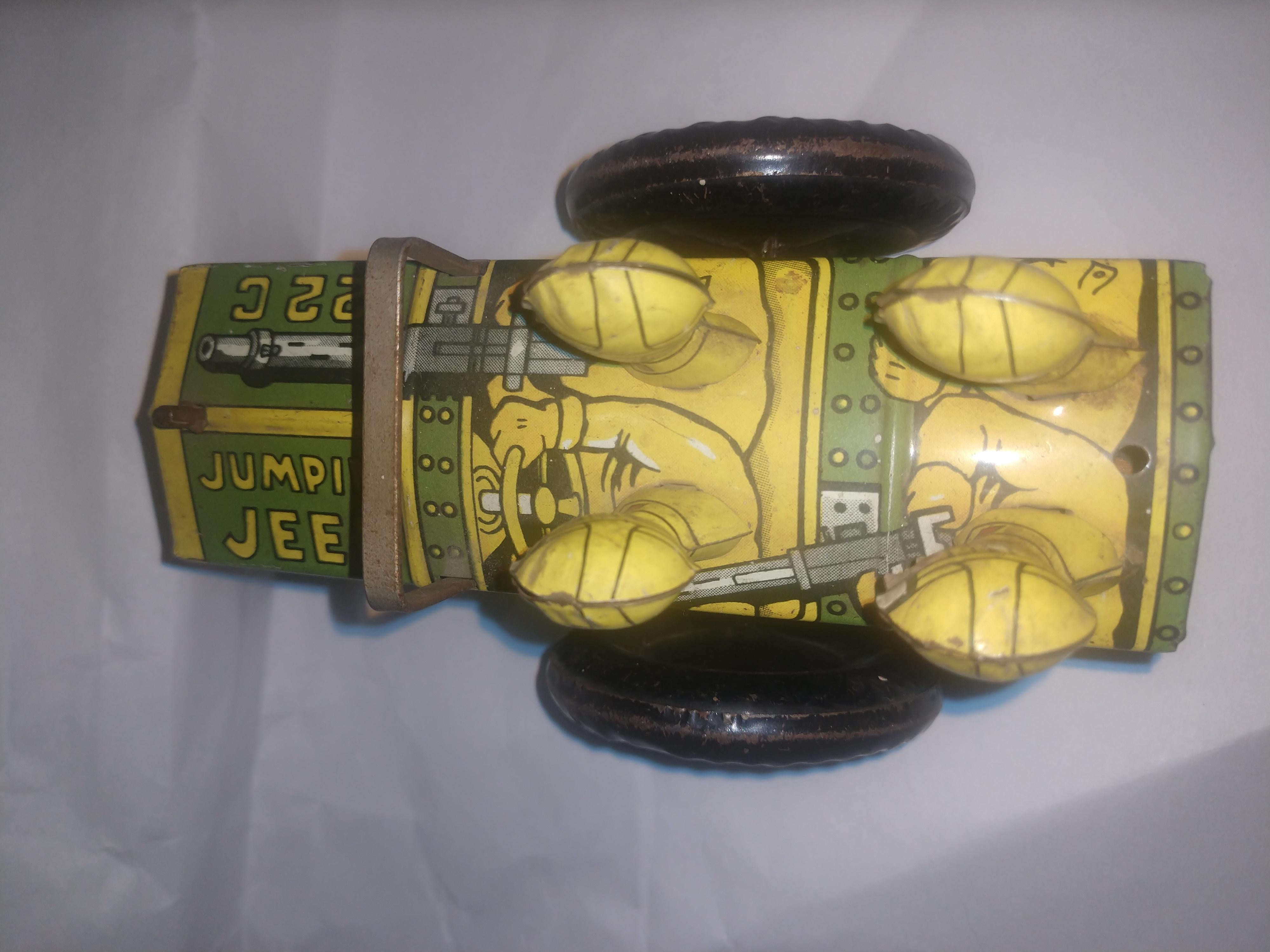 Tin Litho Windup-Spielzeug aus der Mitte des Jahrhunderts von Louis Marx „Jumpin Jeep“ C 1950 (Zinn) im Angebot