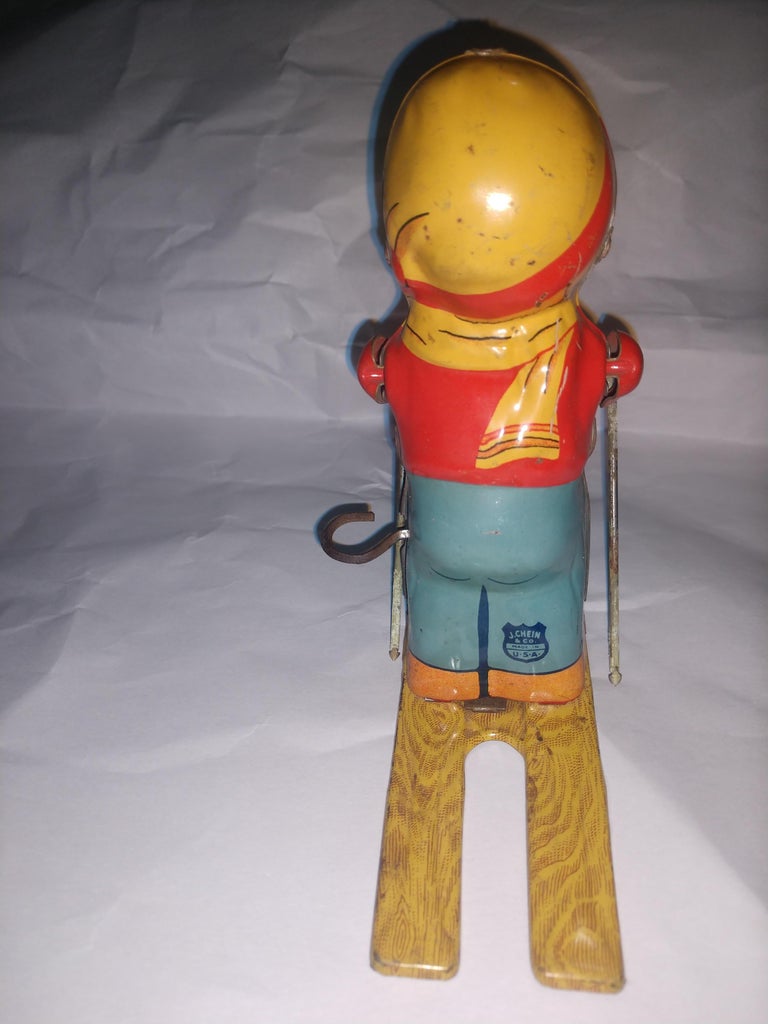 Mid Century Tin Litho Windup Toy Skier Girl by Chein C1945 For Sale 2