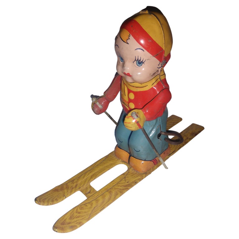 Tin Litho Windup Toy Skier Girl by Chein C1945 For Sale