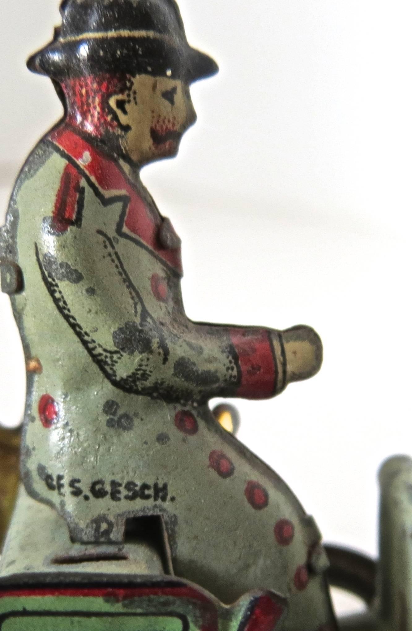 Early 20th Century Tin Penny Toy 'Diminutive' Open Stake Truck with Driver, German, circa 1900