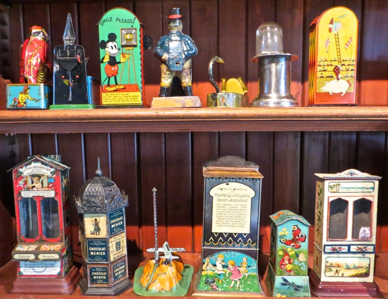 Tin Toy Mechanical Bank Collection '55 Banks', circa 1888 through 1930s