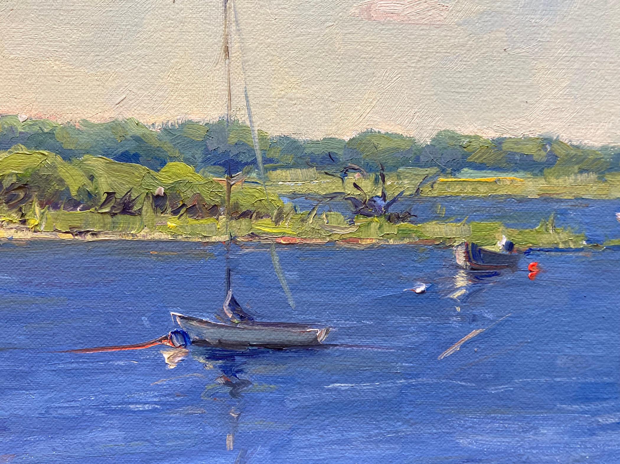 This bright painting, done en plein air, radiates the feeling of summer. Small sailboats float daintily atop electric blue water while the surrounding land looks completely empty of human interference. Orsolic Dalessio created an idyllic scene of