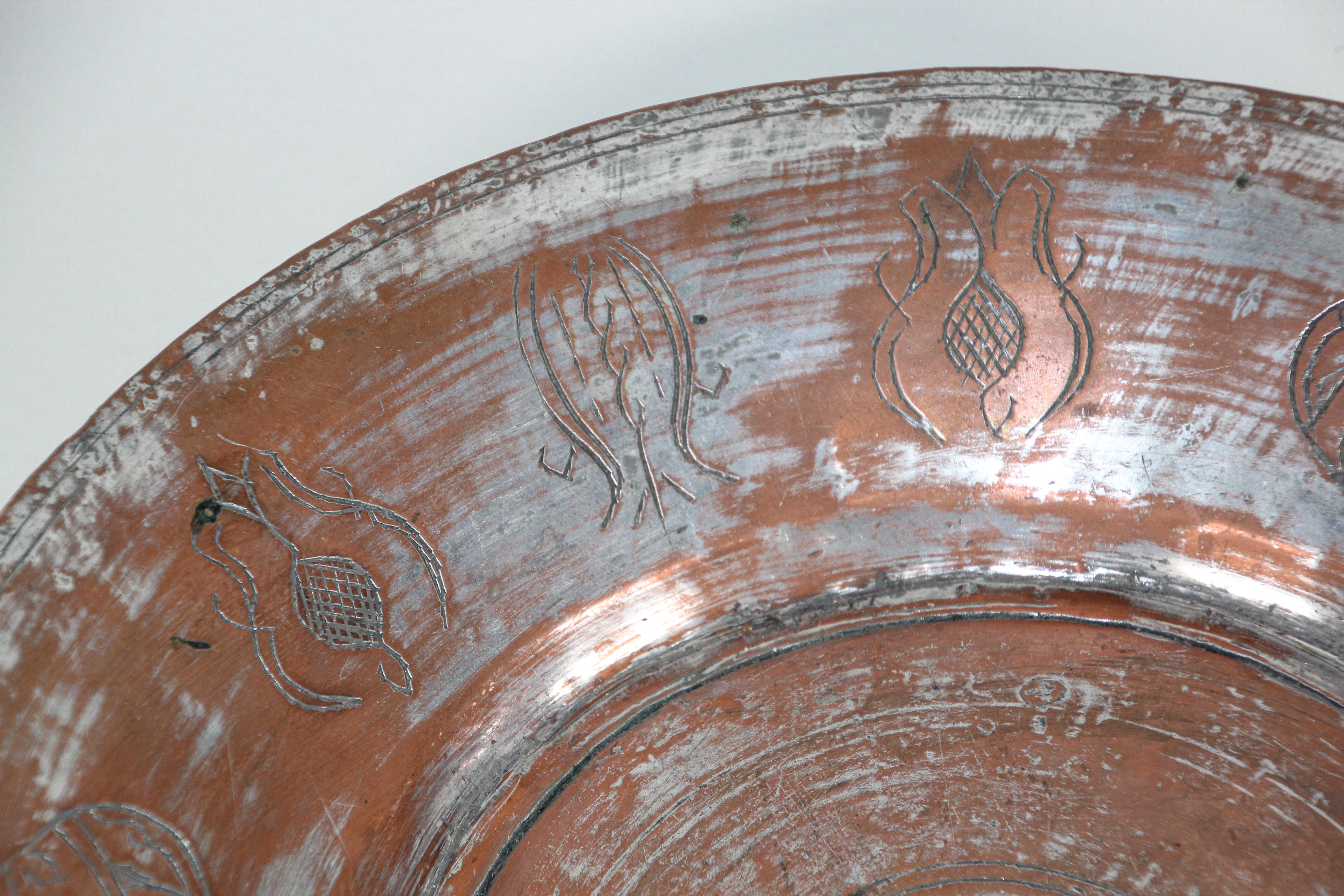 Handcrafted Turkish Ottoman tinned copper metal round vessel.
Middle eastern Asian tinned copper large bowl nicely hand-hammered.
Handcrafted in Turkey.
Maker mark in Arabic in the back.
Measures: 13