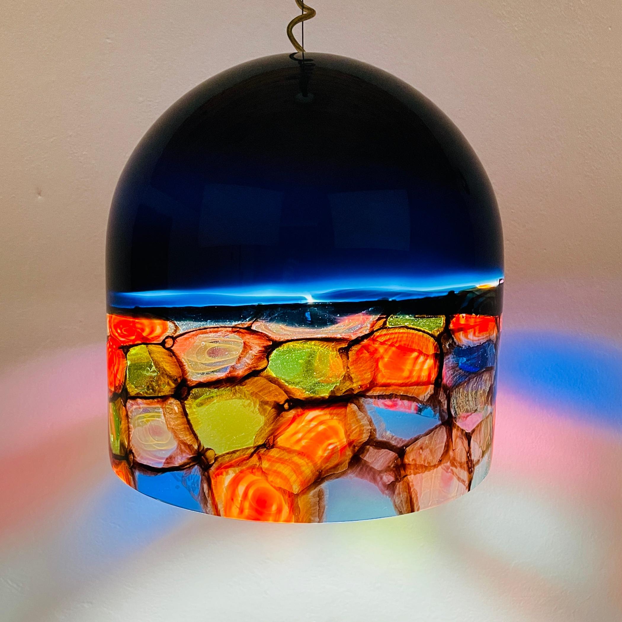 Renato Toso and Noti Massari's original vintage Tinta pendant light is made of Murano glass in Italy. Hand blown glass with multicolor murrine. Leucos' original label. 1971. Cable length is adjustable. Very good vintage condition. No chips or