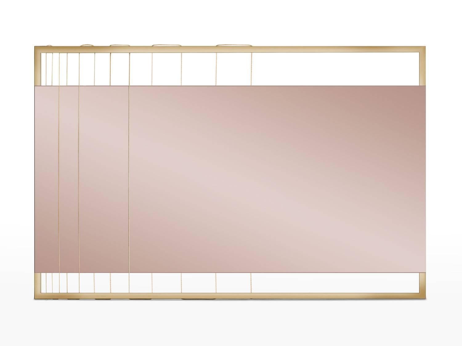 AEGIS-M mirror is made to order using gold finish stainless steel frame, tinted mirror and gold steel wire. The mirror can be hung vertically or horizontally. A modern contemporary design using only the finest materials and manufacturing methods.