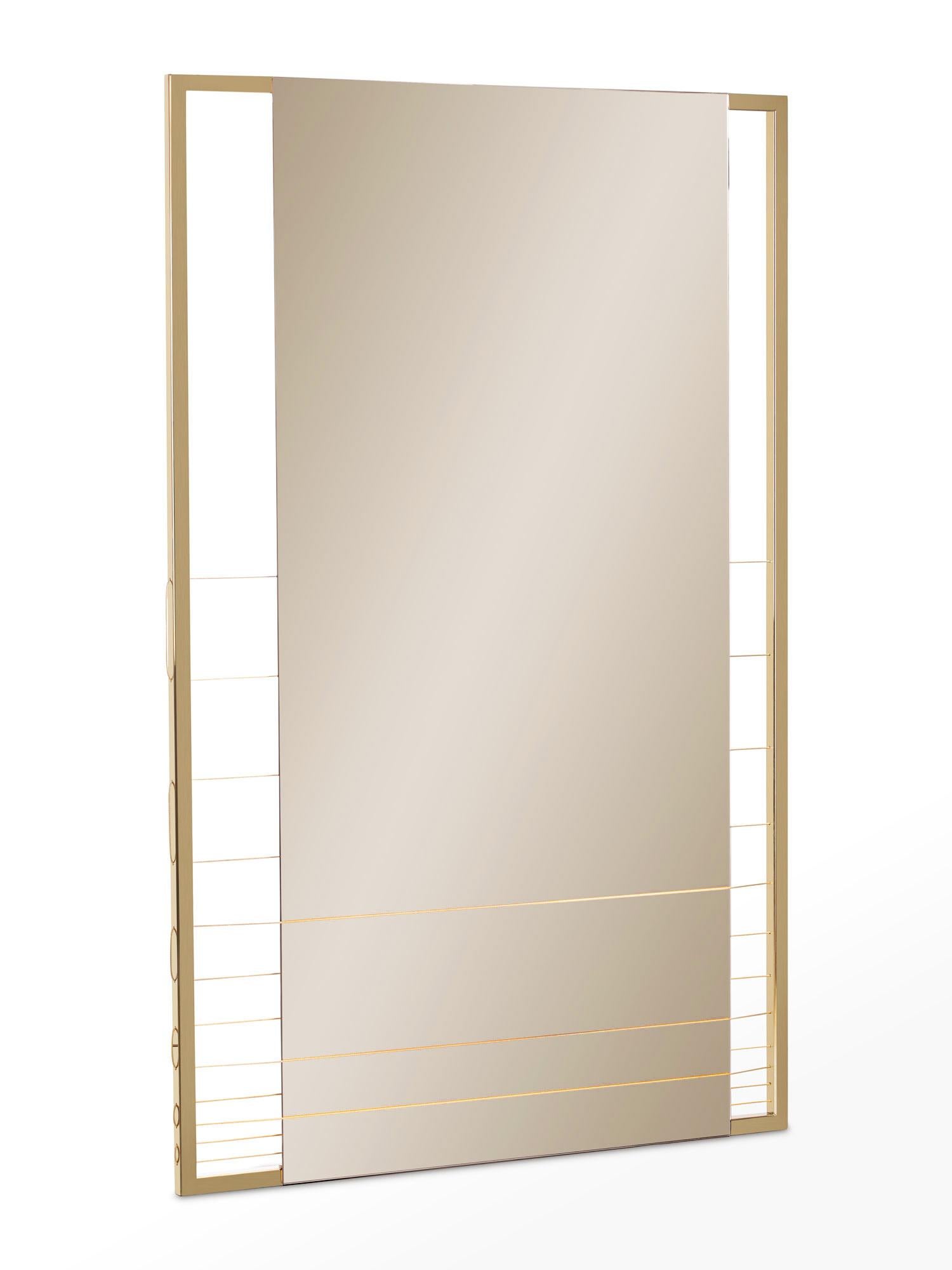 AEGIS-M mirror is made to order using gold finish stainless steel frame, tinted mirror and gold steel wire. The mirror can be hung vertically or horizontally. A modern contemporary design using only the finest materials and manufacturing methods.