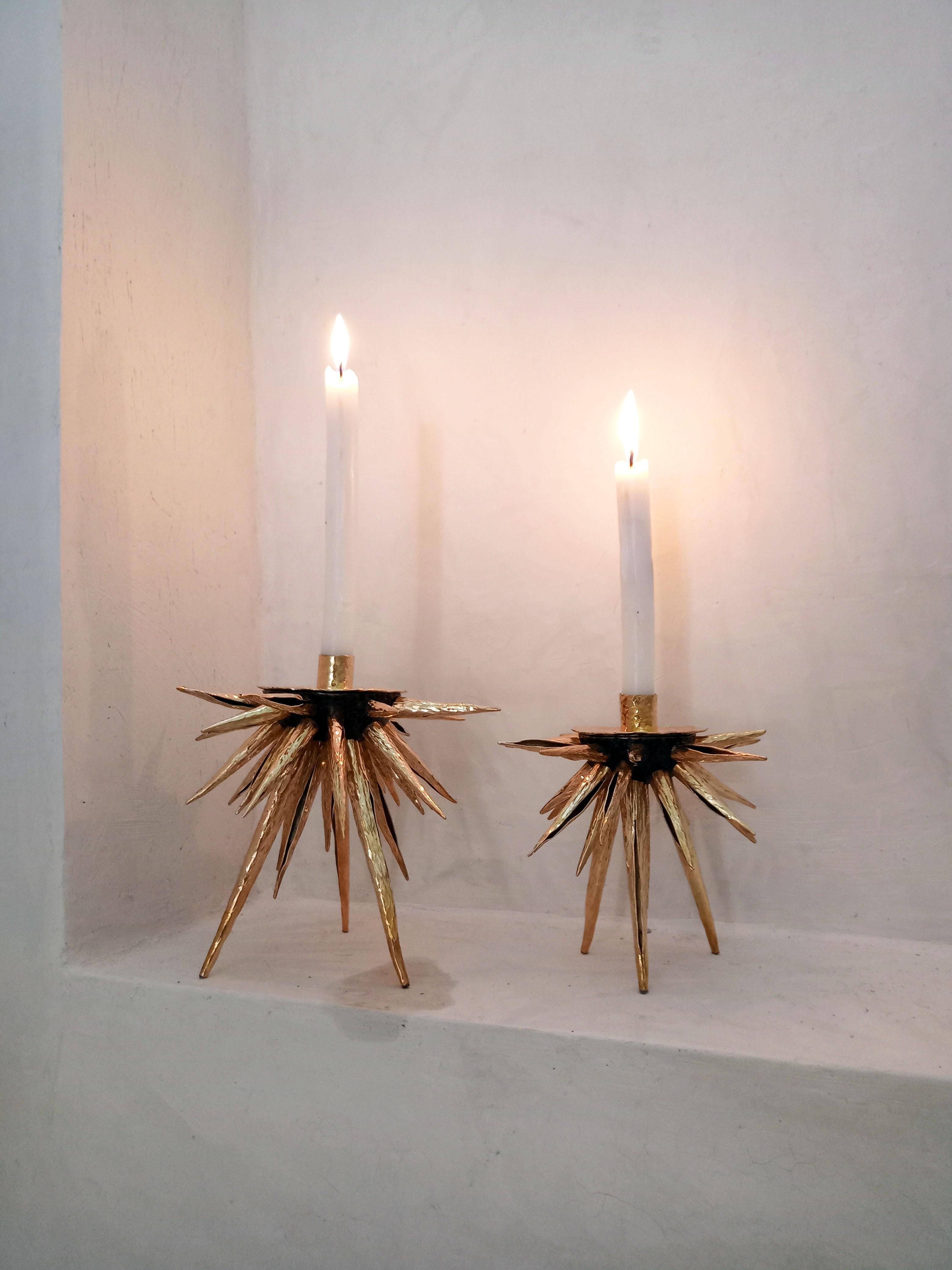 Designed by Cristina Romo, inspired by the wonderfull shapes of marine life, this sea urchin candle holder is made out of Tumbaga, an alloy of copper and zinc, each spike is hand hammered, cut and riveted in the ROMOHERRERA workshops in Taxco,