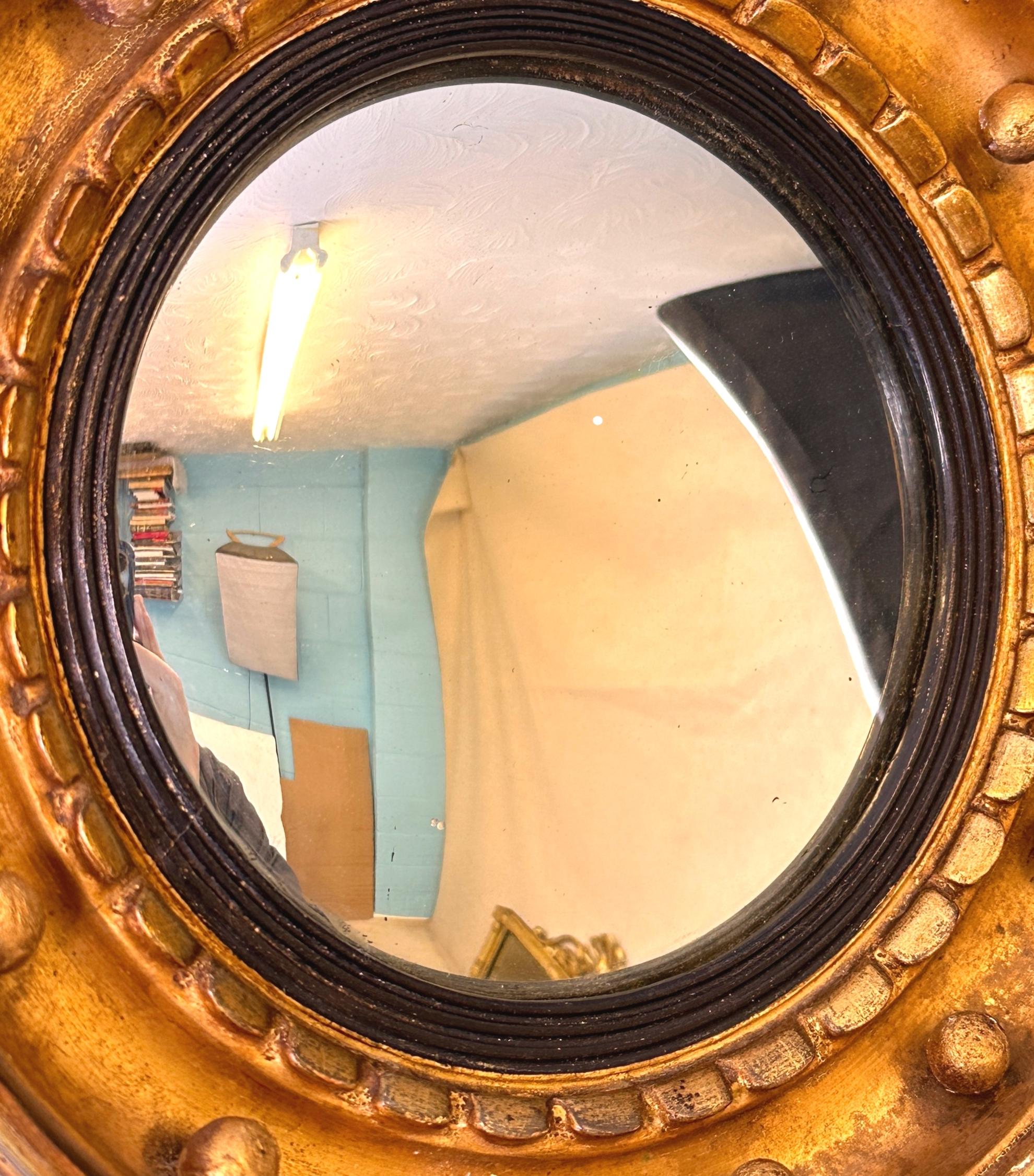 English Tiny 19th Century Regency Gilt Convex Mirror For Sale