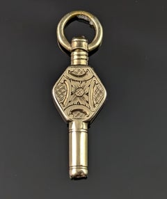 Tiny Antique Victorian 9k gold cased watch key pendant