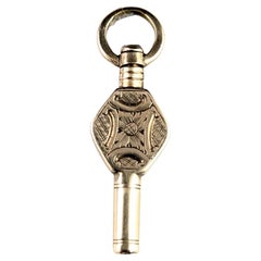 Tiny Antique Victorian 9k gold cased watch key pendant