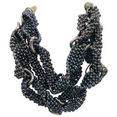 SYLVIA GOTTWALD,  Black pearl loops with French Deco  Deco links, Eco statement.