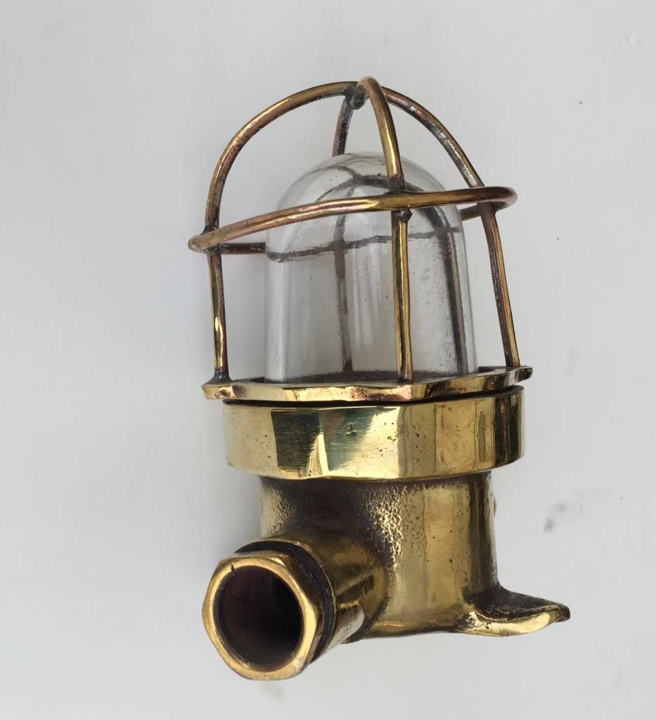 Unusually small reclaimed brass light with a thick transparent glass and a superb aspect. They can be used as ceiling, wall or even table light creating a subtle point of light. Perfect for a tiny room like the bathroom, or just to add some little