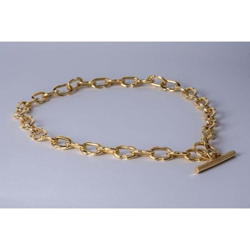 Chain necklace in polished gold plated sterling silver. Sterling silver substrate is electroplated with 18k Gold and then dipped into acid to create the subtly destroyed surface.
Chain link size (L × H): 14 mm × 9 mm
Chain length: 430 mm