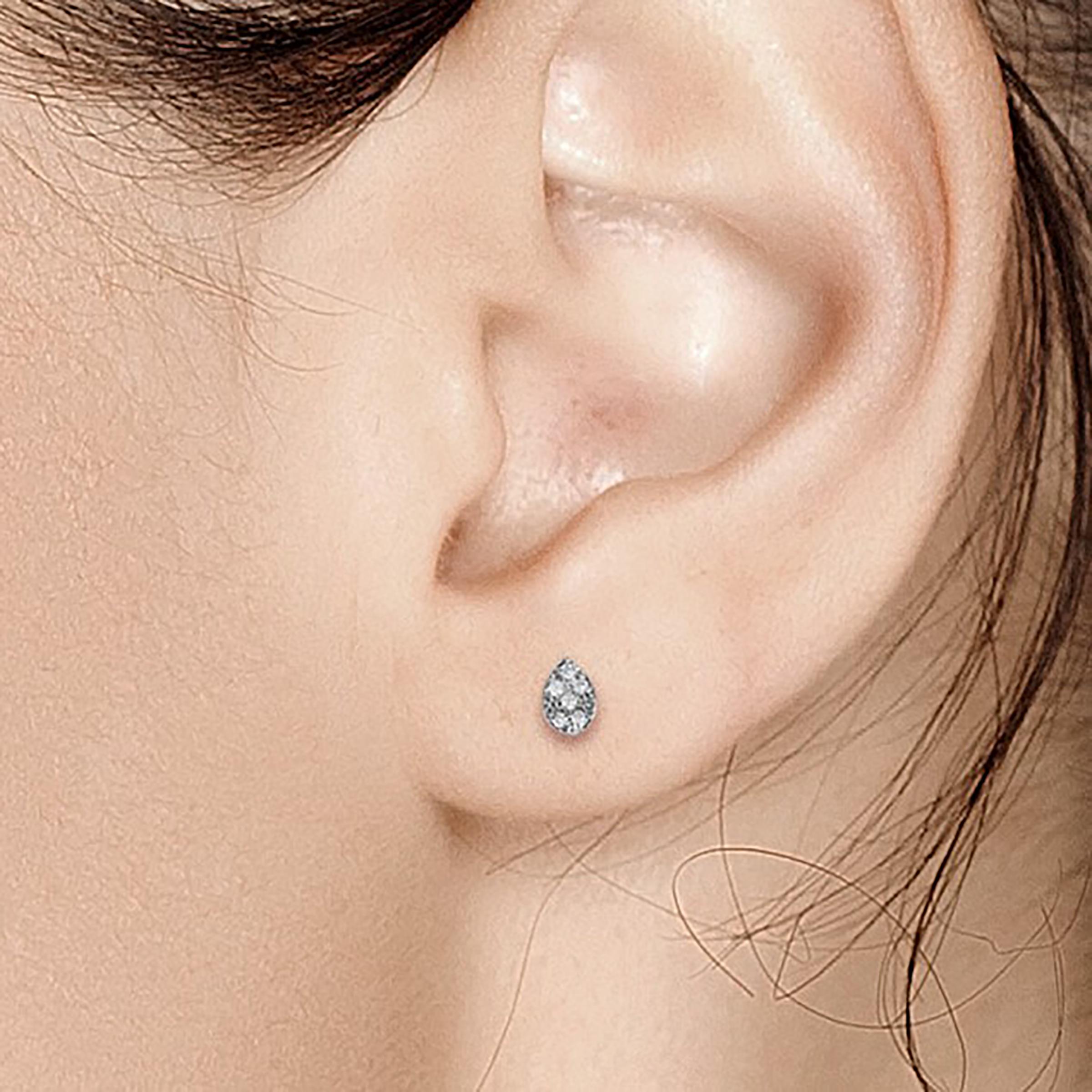 Contemporary Fourteen Karat Gold Pear Shape Design Diamond Stud Earrings Measuring 0.25 Inch 