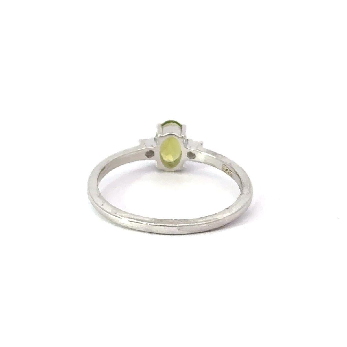 For Sale:  Tiny Everyday Oval Green Peridot with CZ Gift Ring for Women Gift in 925 Silver 7