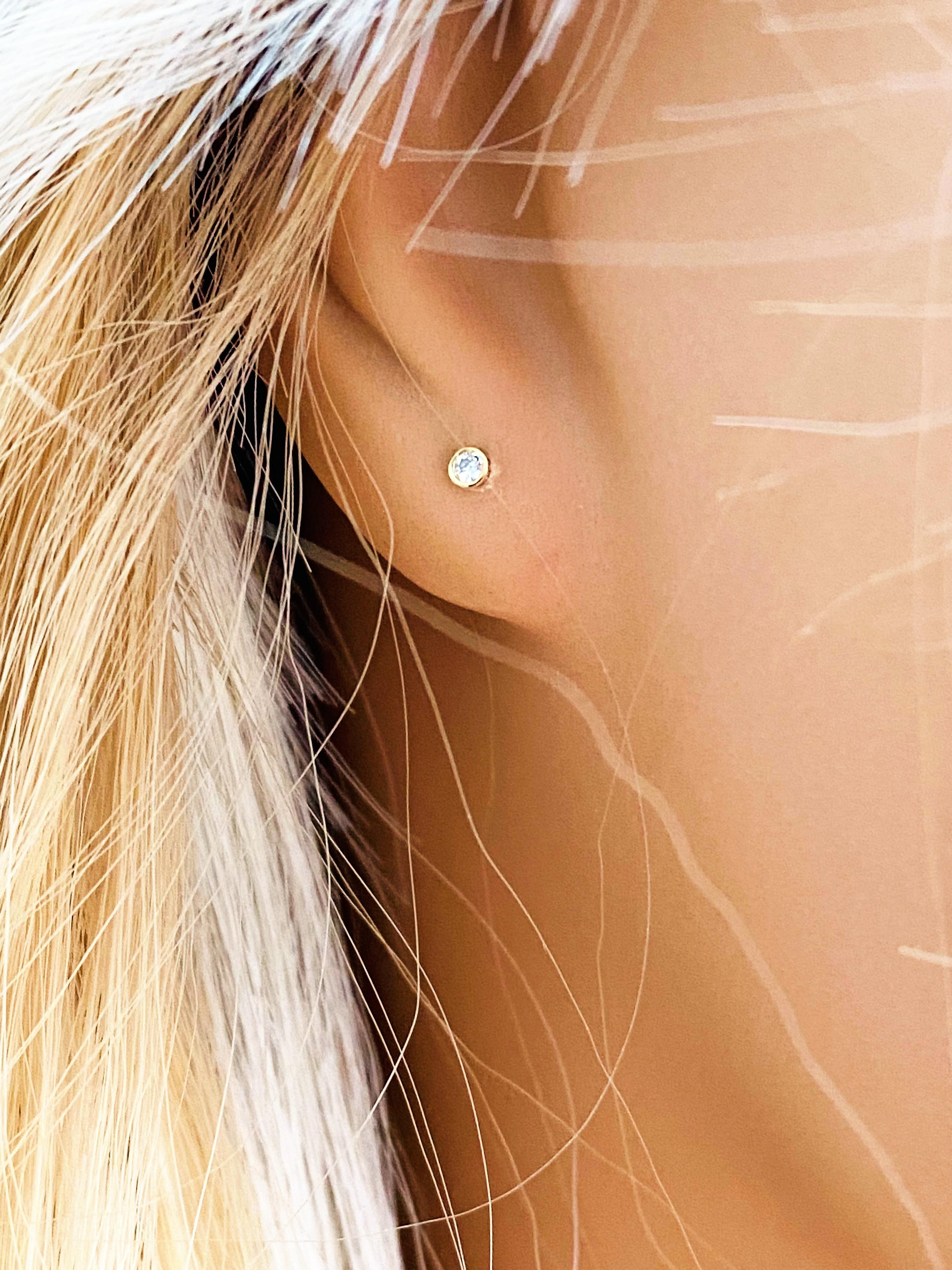 Contemporary Tiny Fourteen Karat White Gold Diamond Stud Earrings for Third Hole