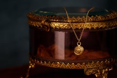 Tiny Gold Snail Shell Pendant