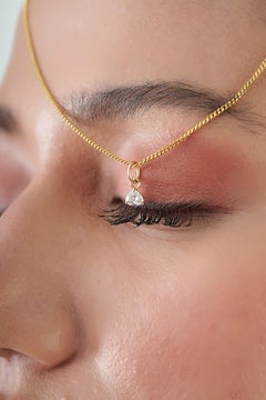 Petit charme solitaire en forme de cœur serti d'un diamant, en or jaune 14 carats