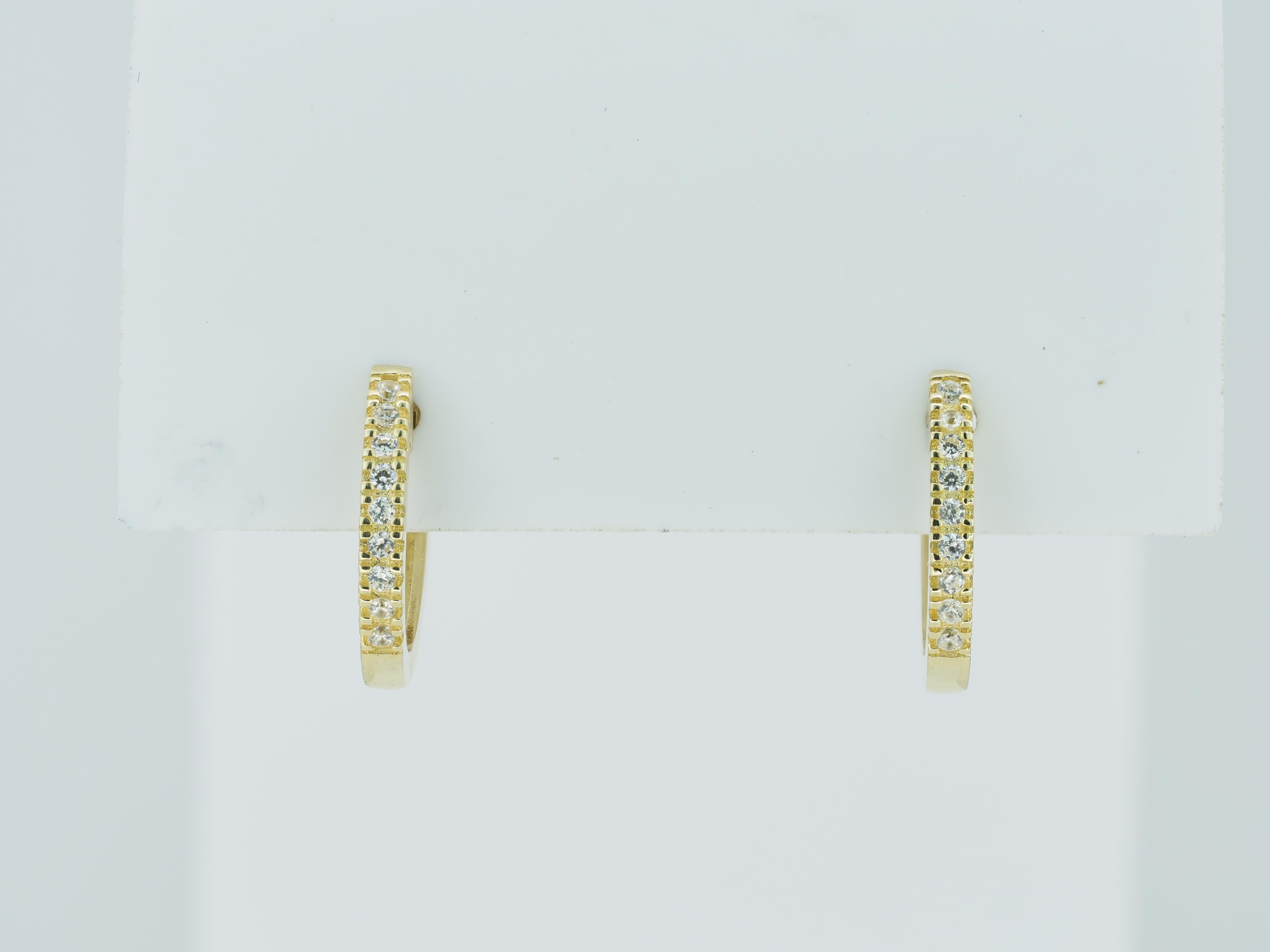 Round Cut Tiny Huggie Hoop Earrings in 14 Karat Yellow Gold. For Sale