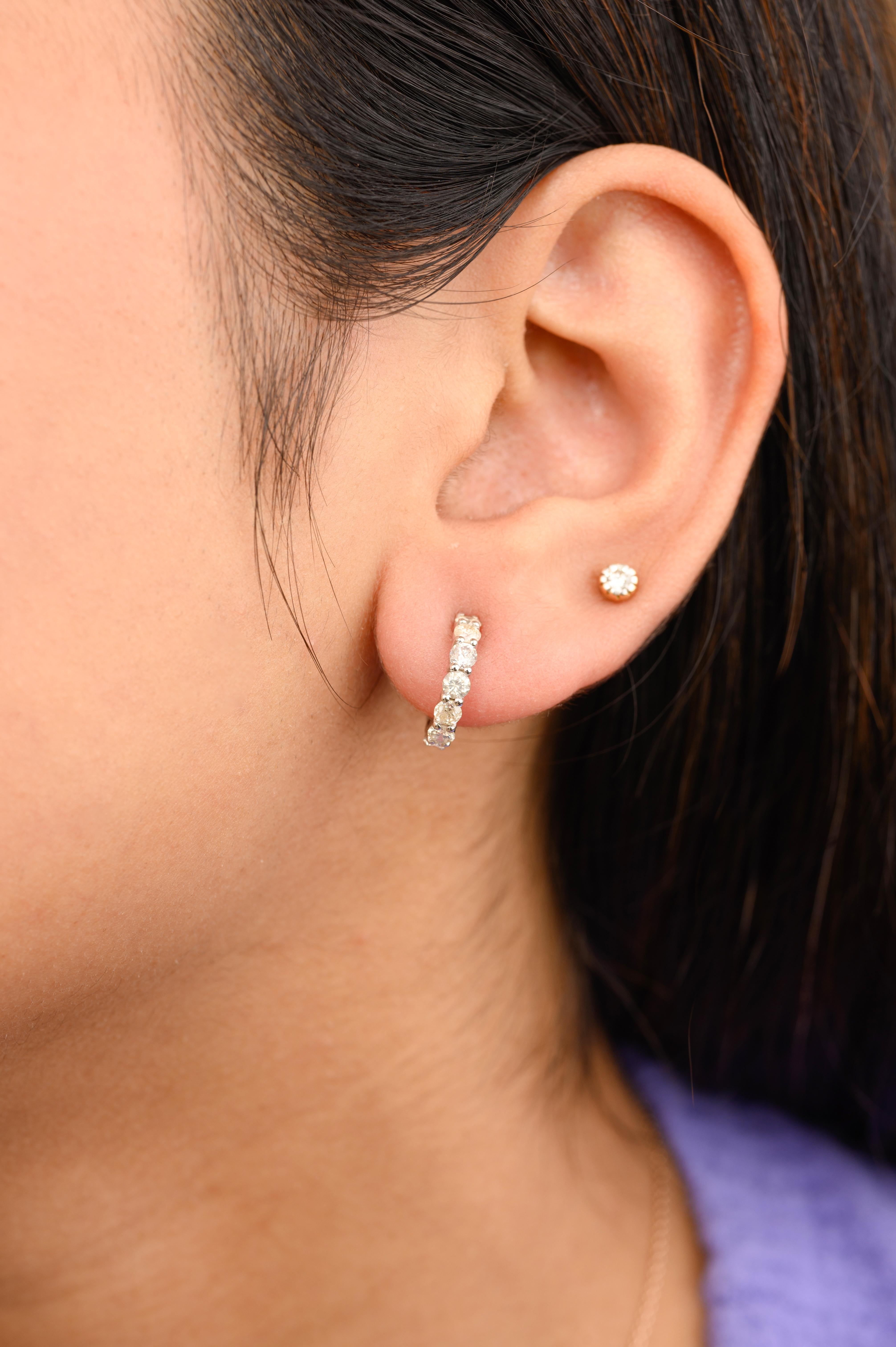 Tiny Natural Diamond Hoop Earrings in 18K Gold to make a statement with your look. You shall need stud earrings to make a statement with your look. These earrings create a sparkling, luxurious look featuring round cut diamonds.
Diamond brings love,