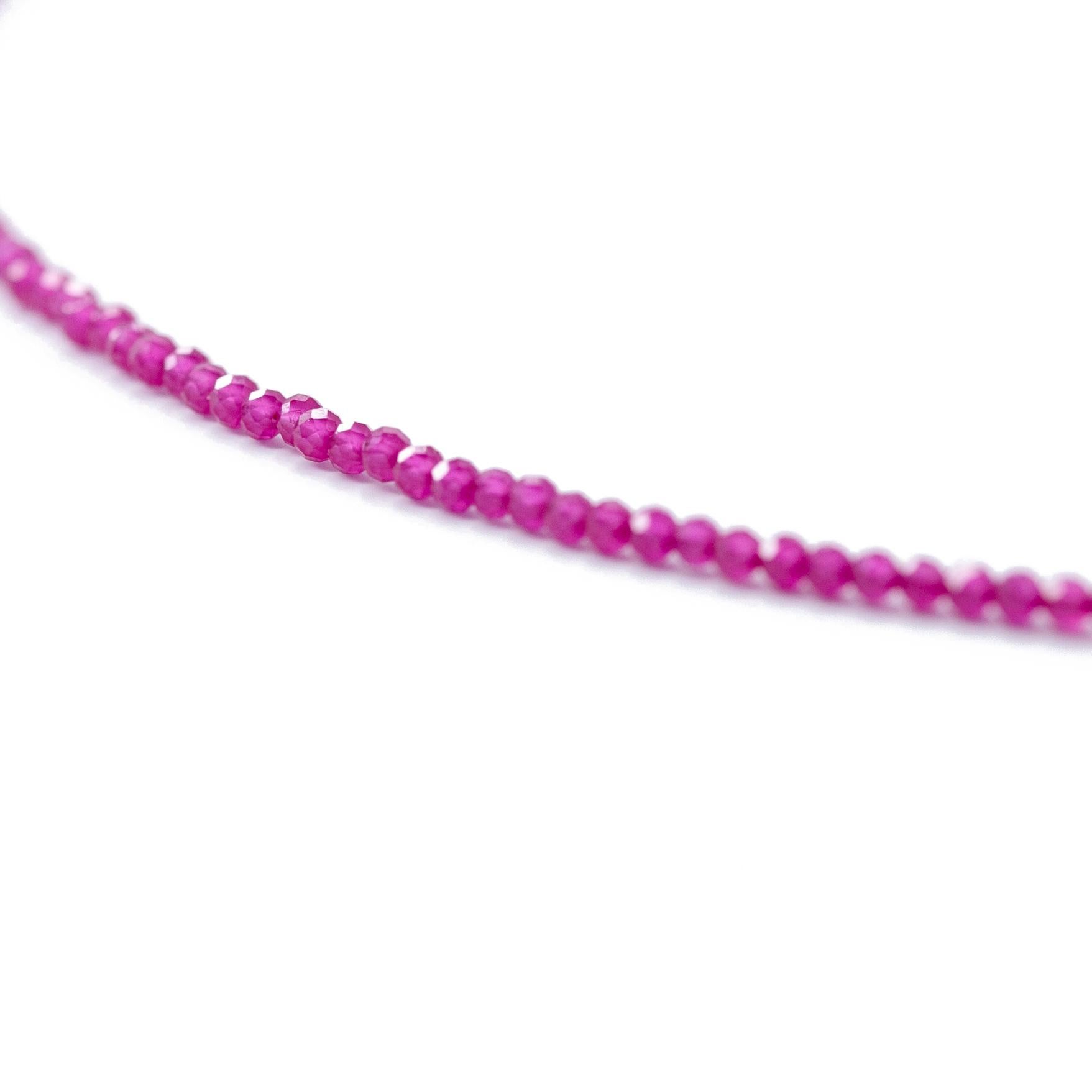 This necklace featuring mini beaded Ruby Gemstones. Fastens with a 120K Gold Plated Sterling Silver hook closure. A perfect pop of color to pair with your favorite day and casual outfit. We love this necklace layered with gold chains and adding a