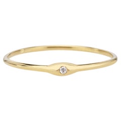 Tiny Stackable Organic Form Ring in 14kt Yellow Gold Set with One Diamond