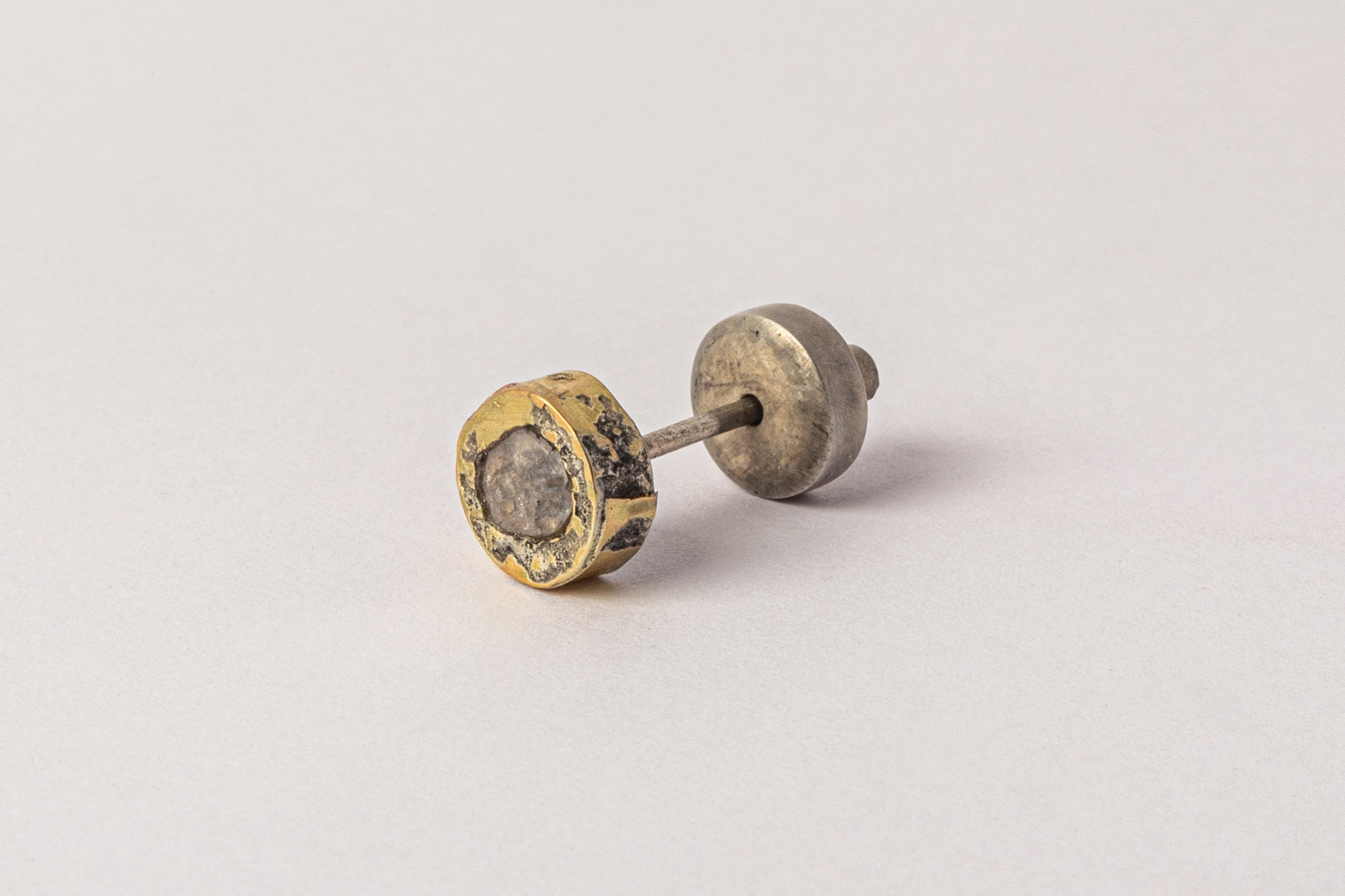 Tiny stud earring in sterling silver, fused layer of 18k yellow gold, and slab of rough diamond. This slab is removed from a larger chunk of diamond. This item is made with a naturally occurring element and will vary from the photograph you see.