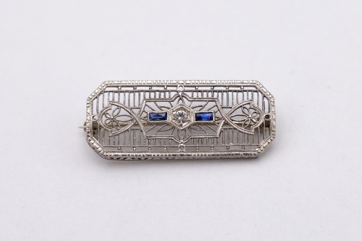 Tiny White Gold Art Deco brooch with Diamond and Sapphires.