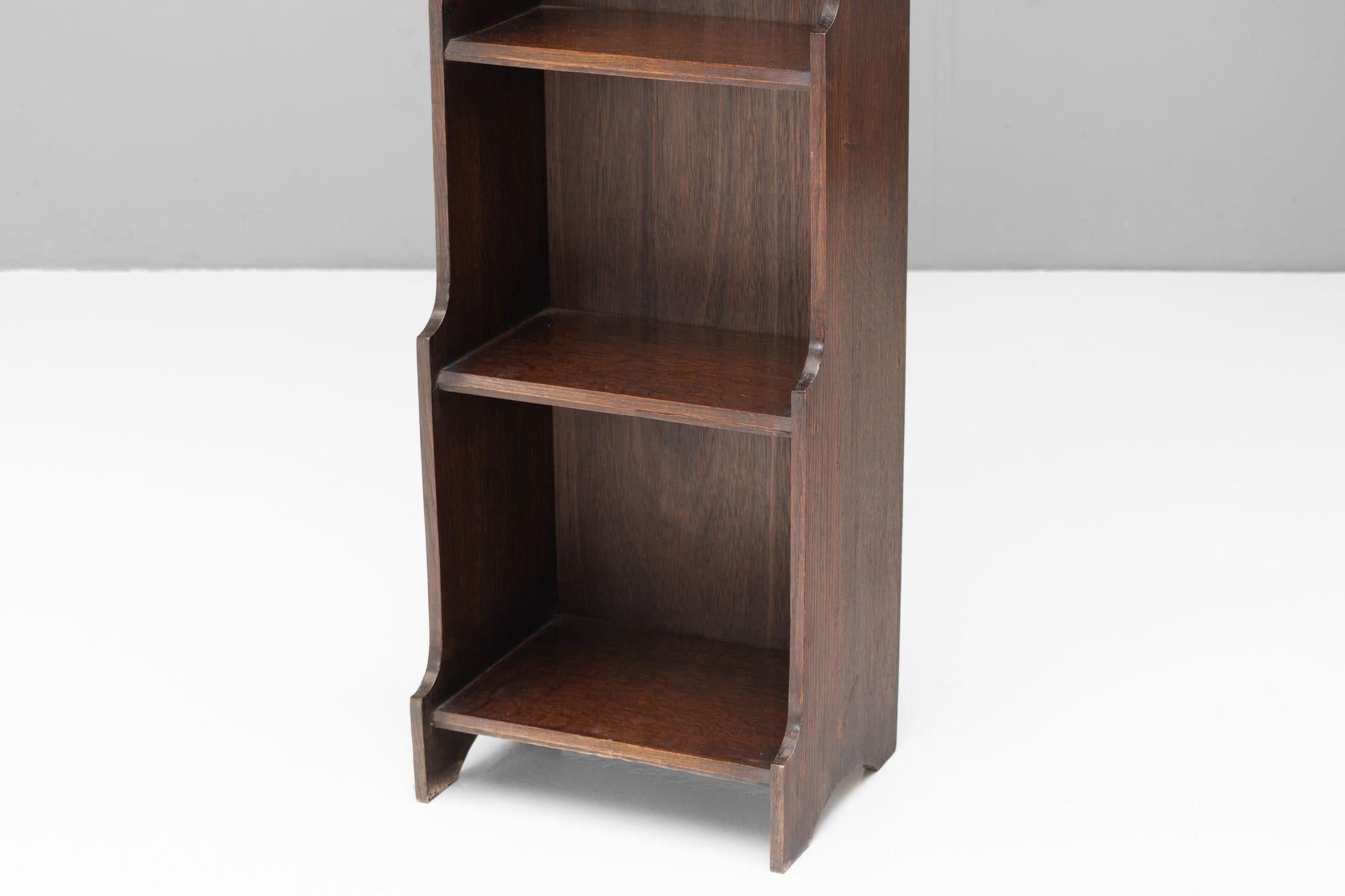 Mid-20th Century Tired Bookcase For Sale